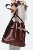 KNOTTED TOPSTITCHED BUCKET BAG