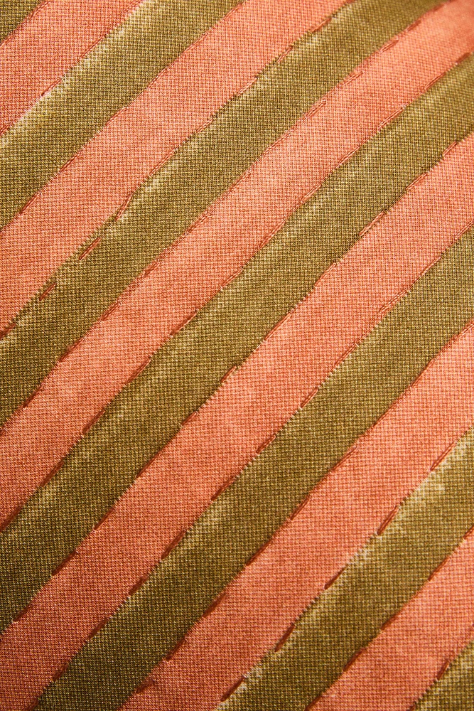 STRIPED CYLINDRICAL CUSHION
