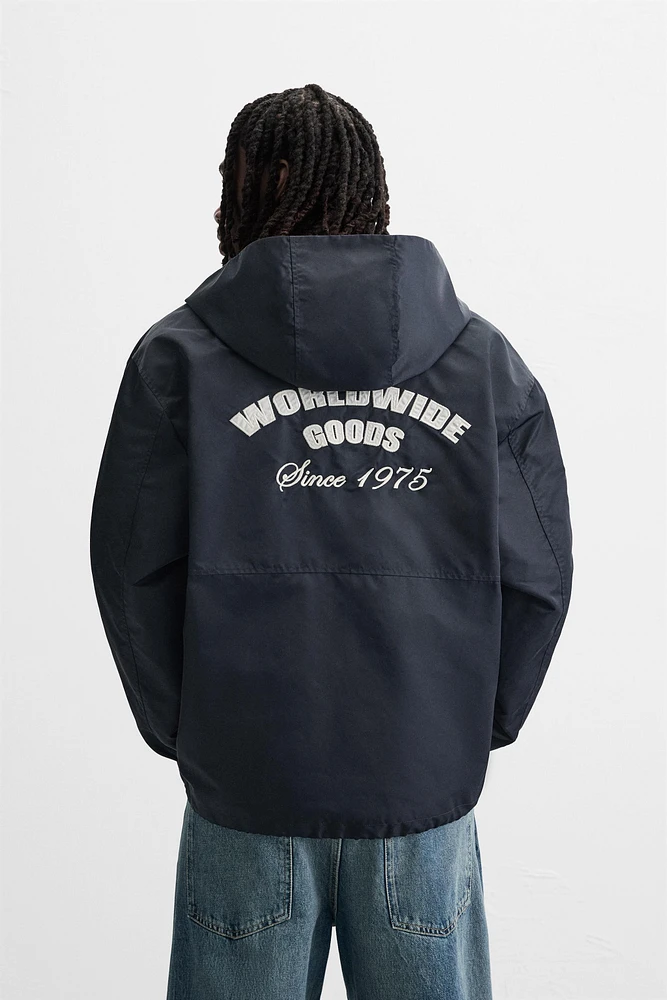HOODED TECHNICAL JACKET