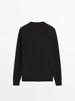 Cotton knit sweater with buttoned neck