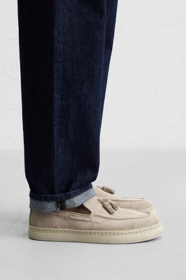 MOCASSINS EN CUIR À POMPONS CASUAL
