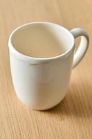 EARTHENWARE MUG WITH A RAISED-DESIGN EDGE