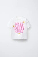 T-SHIRT À INSCRIPTION ET DÉCOR FLEURS
