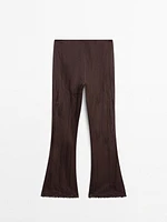 Capri trousers with blonde lace detail