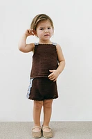 SHORT EN MAILLE À MARGUERITES