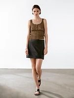 Textured nappa leather mini skirt