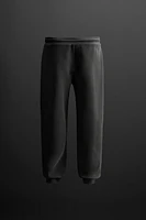 PANTALON DE JOGGING TECHNIQUE À ZIPS