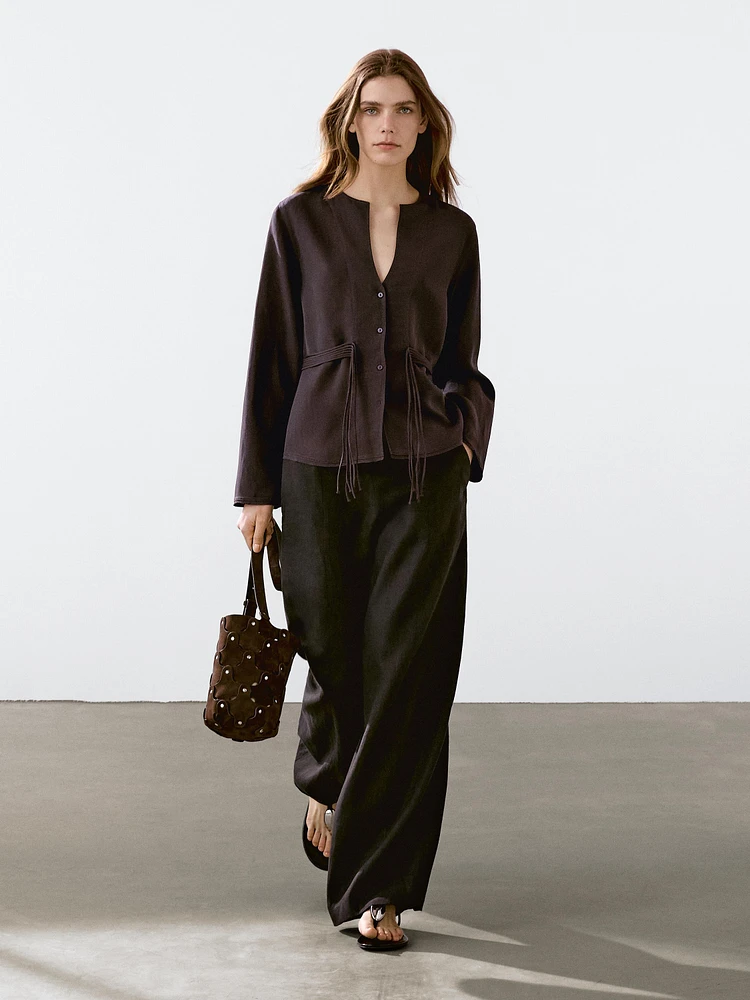Flowing shirt with cord details