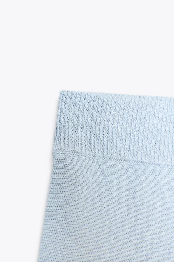 BOX PLEAT KNIT MINI SKIRT