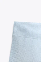 BOX PLEAT KNIT MINI SKIRT