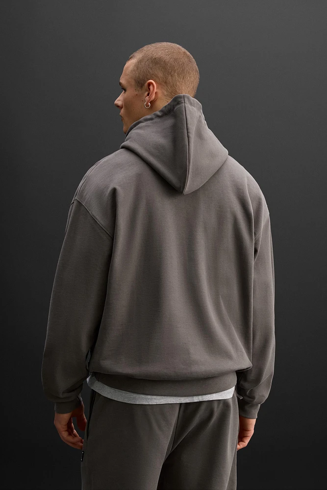 SWEAT À CAPUCHE