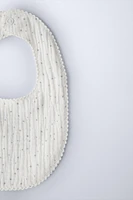 TEXTURED WEAVE BIB WITH STARS