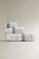 BATH TOWEL WITH EMBROIDERED BORDER