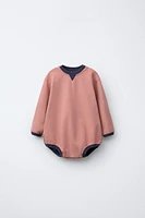 CONTRAST PLUSH BODYSUIT