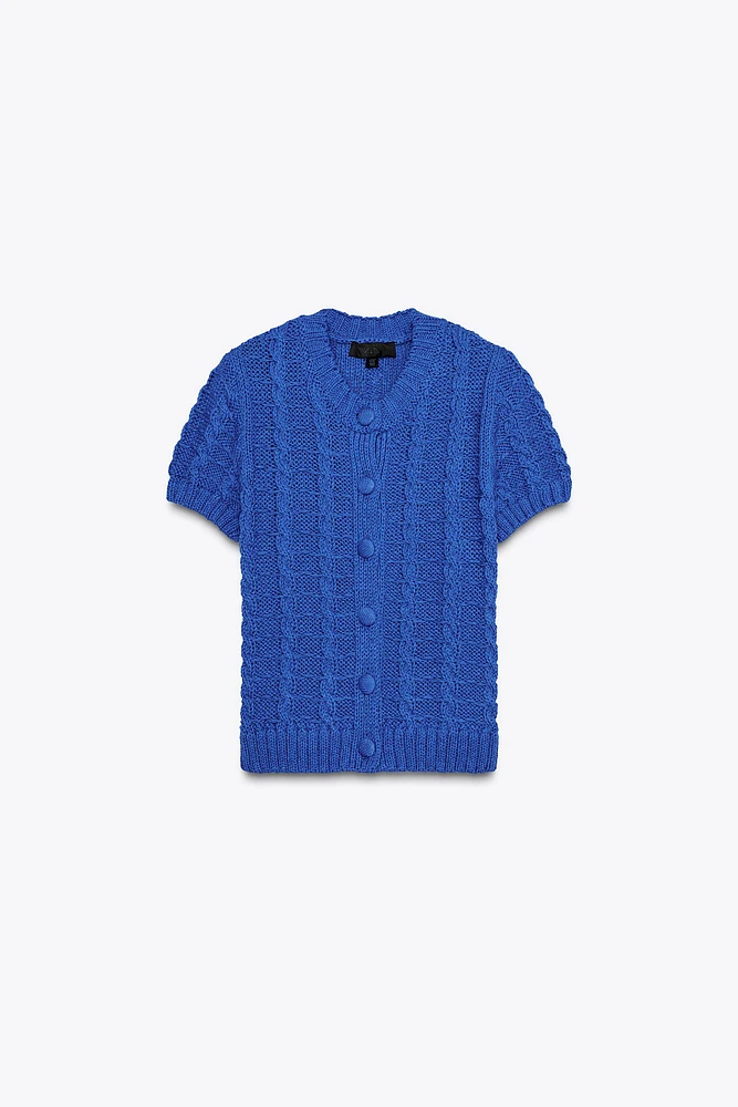 GILET EN MAILLE À MANCHES COURTES