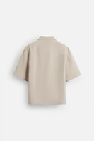 FLOWY POLO SHIRT