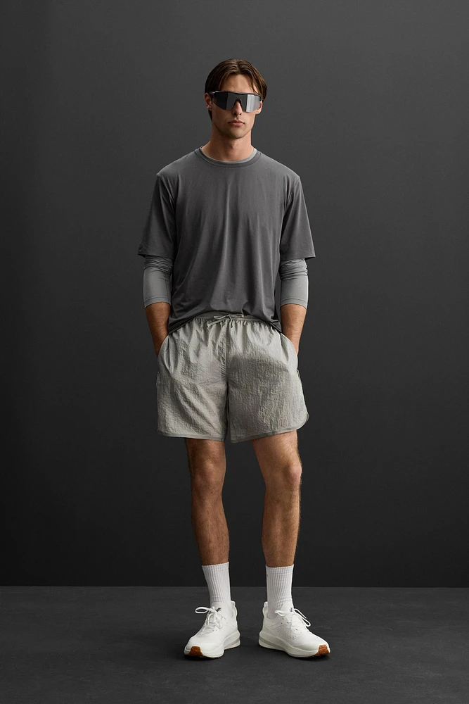 STRUCTURED RUNNING SHORTS