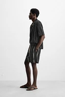 CONTRAST EMBROIDERY SHORTS