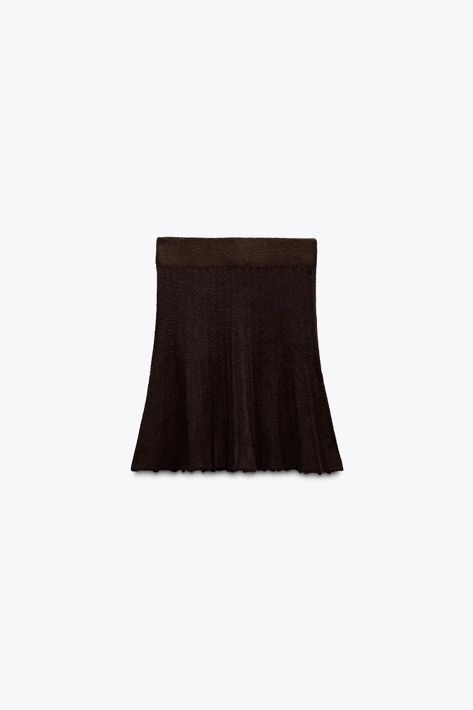 PLEATED SOLID KNIT SKIRT