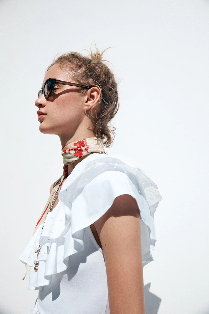 ASYMMETRIC EMBROIDERED TOP