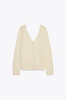 PULL EN MAILLE À BOUTONS