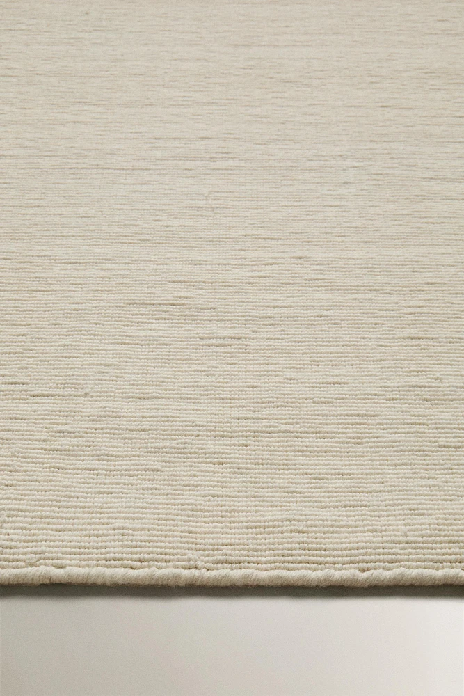 SMALL WOOL AREA RUG WITH WAVY LINES