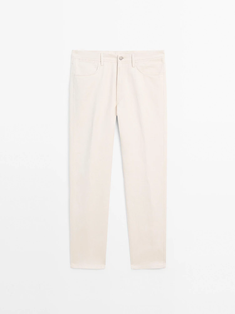 Cotton blend tapered fit denim trousers
