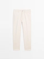 Cotton blend tapered fit denim trousers