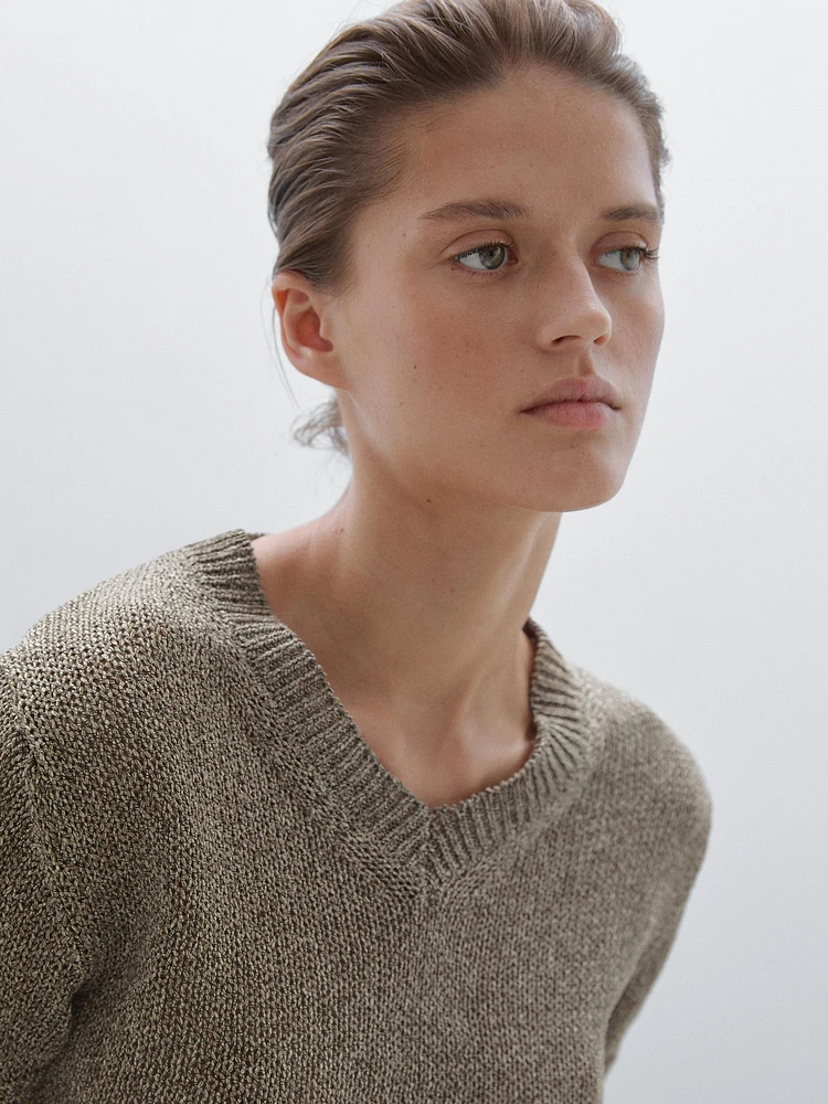 Knit sweater with fabric detail