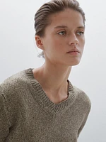 Knit sweater with fabric detail