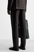 WAXED EFFECT SUIT PANTS