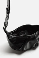 OVAL CROSSBODY BAG
