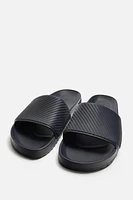 CLAQUETTES DE PLAGE