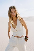 TOP HALTER SURPIQUÉ