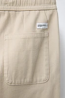 TEXTURED STRETCH PANTS