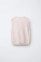 GILET EN MAILLE FLEURS BRILLANTS