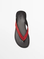 Split suede sandals with toe divider