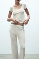 PANTALON EN MAILLE POINTELLE