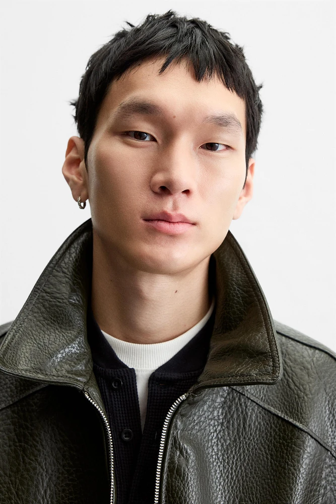 EMBOSSED FAUX LEATHER JACKET