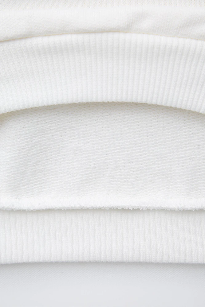 PRINT AND PATCH SWEATSHIRT