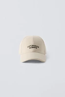 EMBROIDERED TEXT CLOTH CAP