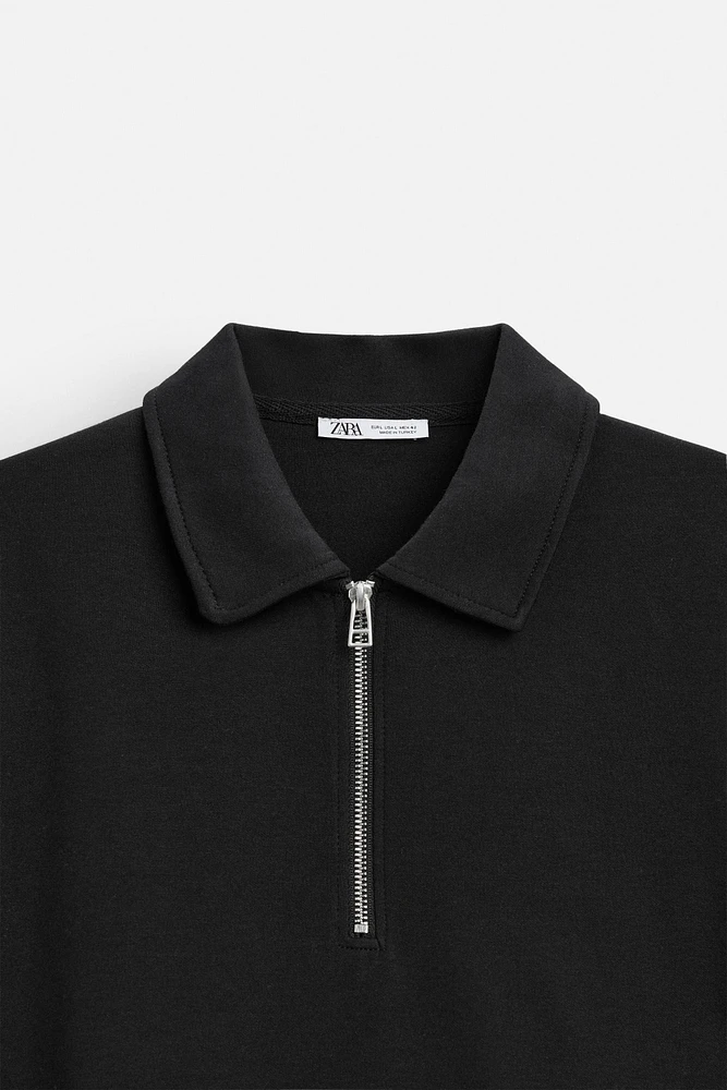 INTERLOCK POLO QUARTER-ZIP SWEATSHIRT