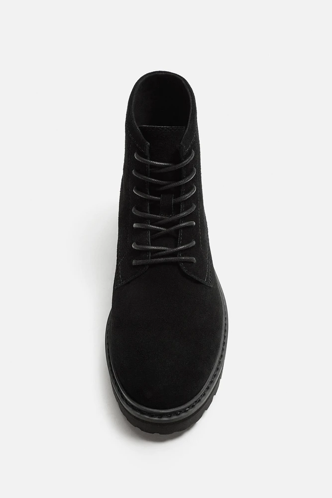 BOTTES À LACETS EN CUIR