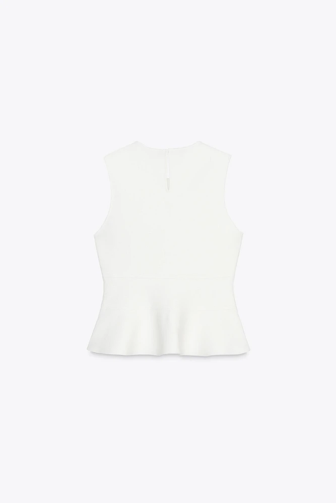 TOP EN MAILLE PÉPLUM AVEC LACETS