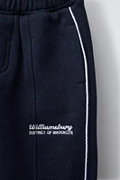 PANTALON DROIT EN MOLLETON À INSCRIPTION