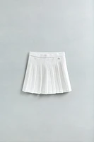 PLEATED SKIRT WITH HEART APPLIQUÉ