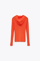 GILET EN MAILLE À CAPUCHE ET BORD CÔTELÉ