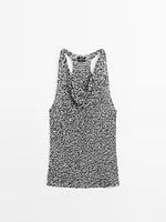 Top drapé en maille chinée