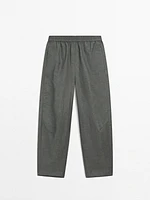 Suit trousers with elasticated waistband