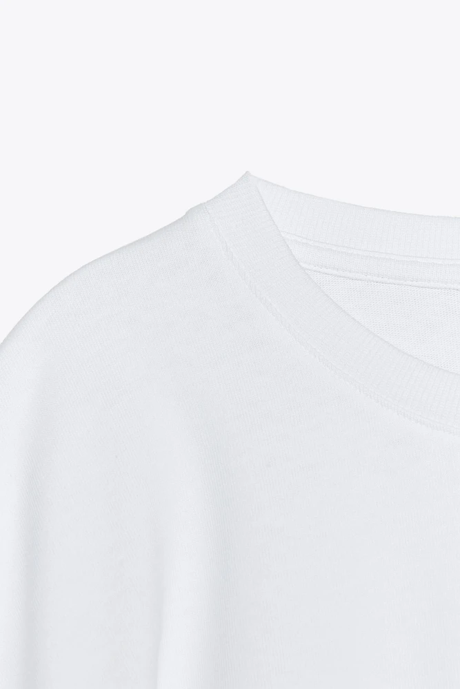 T-SHIRT DÉLAVÉ À MANCHES CAPE